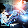 woman behind car steering wheel