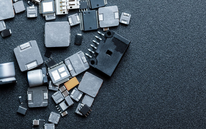 Image showing two various passive components scattered on the floor